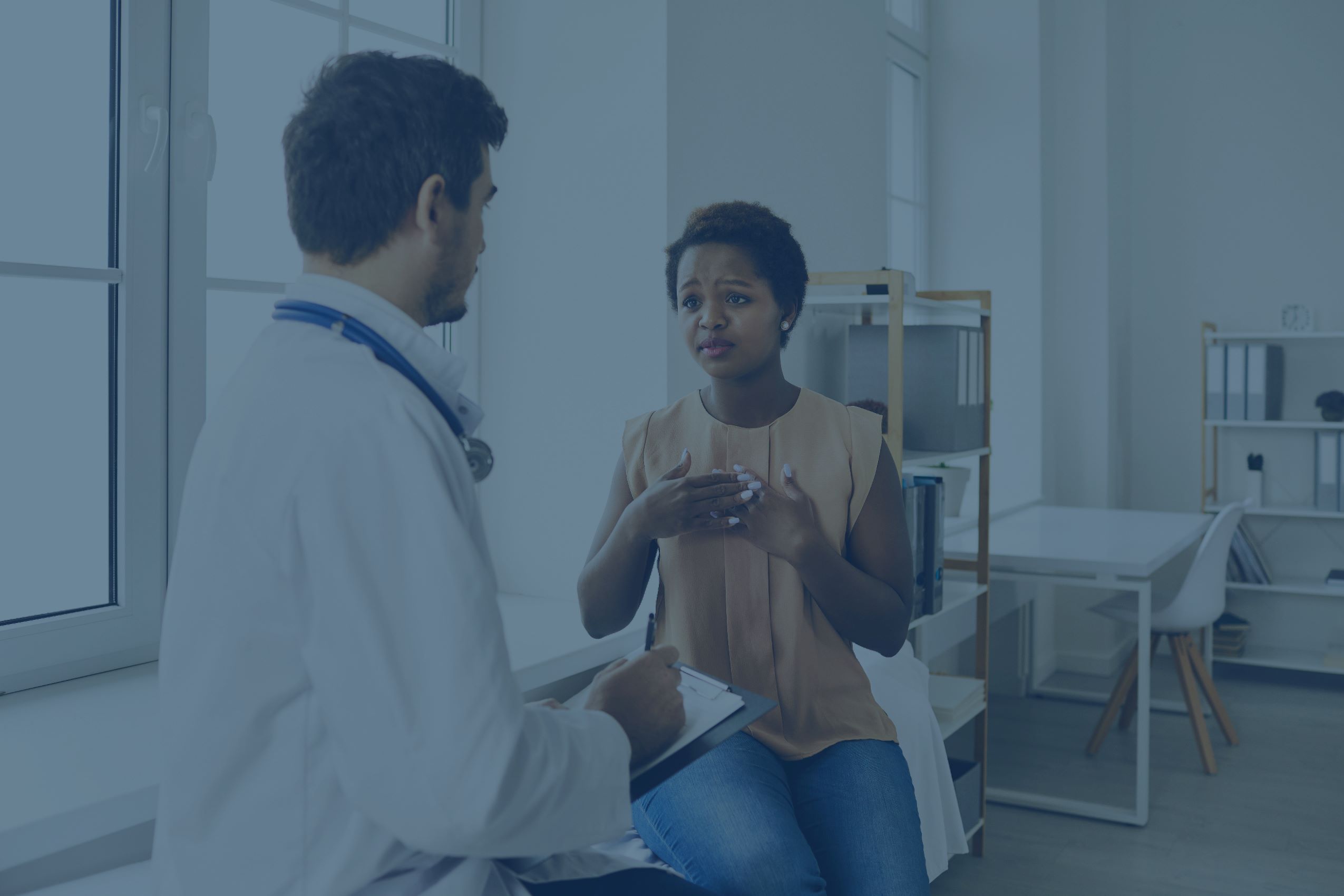 Woman speaking with health care provider